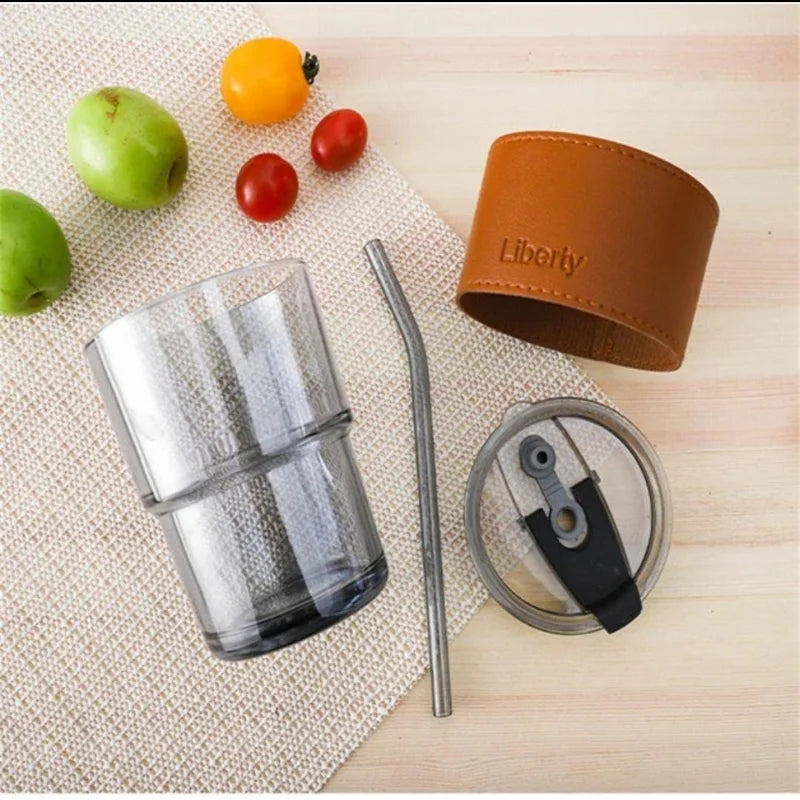 Stylish glass cup with lid and straw