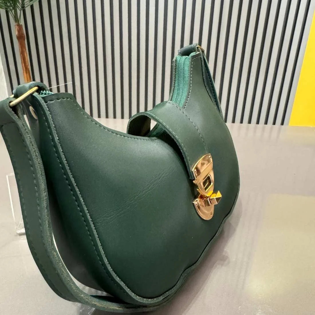 Elegant deep green shoulder bag